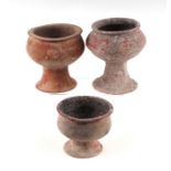 Antiquities. A group of early polychrome pottery pedestal bowls, the largest 16cms high (3).