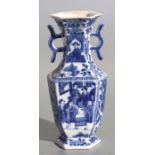 A Chinese blue & white hexagon form two handled vase decorated with ladies on terraces, 23cms high.