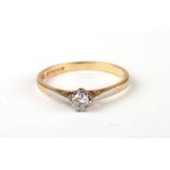 An 18ct gold diamond solitaire ring, approx UK size 'M', 2g.