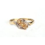 A 9ct gold and citrine dress ring, approx UK size 'O', 1.2g.