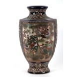 A large Japanese Satsuma vase decorated with figures in a landscape on a deep blue ground, 37cms