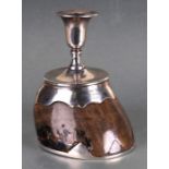 A Roland Ward silver mounted horse hoof desk top candlestick inscribed to 'H.L.W From J.A.O.E. The