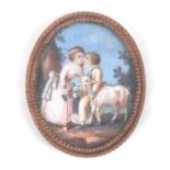 An 18th century French yellow metal mounted miniature on ivory, Children embracing a goat, 4 by