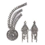 A Georgian cut steel comet form brooch; together with two cut steel earrings (3).Condition