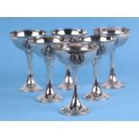 A set of six Thailand sterling silver champagne cups with ornate traditional roundels to the