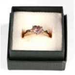 A 9ct gold diamond and heart shaped amethyst dress ring, approx UK size 'N', 3g.