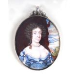 A 17th century white metal framed portrait miniature of a lady wearing a blue dress with a country