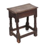 A 17th century style oak joint stool, 46cms wide.