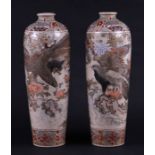 A pair of late 19th century Japanese Satsuma vases decorated with eagles and gilt highlights, of