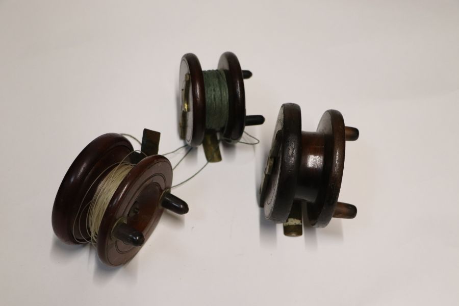 A group of vintage fishing reels to include a Starback example.Condition ReportThe reel with the - Image 11 of 13