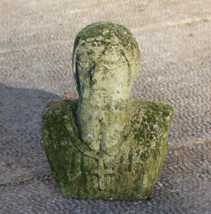 An early carved limestone bust of a priest with a female demon to verso, probably 16th / 17th