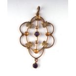 An Edwardian 9ct gold amethyst set pendant, 4cms high, 1.3g.