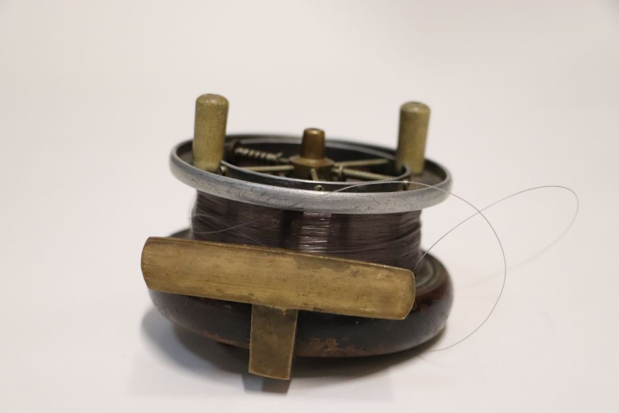 A group of vintage fishing reels to include a Starback example.Condition ReportThe reel with the - Image 5 of 13