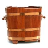 A coopered twin-handled log bin, 45cms wide.