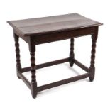 A 19th century oak side table with rectangular top, on barleytwist supports joined by stretchers,