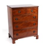 A 19th century mahogany chest of two short and three graduated long drawers, on ogee bracket feet,