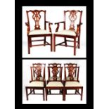 A set of 19th century style mahogany dining chairs with pierced back splats, square legs and drop in