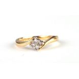 An 18ct gold and four diamond pave set ring, approx UK size 'L', 4g.