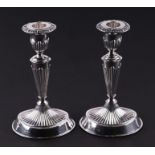 A pair of Victorian loaded silver candlesticks, London 1898, 19cms high.