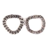 A matched pair of heavy silver men's curb link bracelets, 178g (2).Condition ReportBoth bracelets