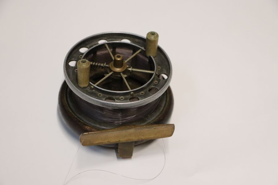 A group of vintage fishing reels to include a Starback example.Condition ReportThe reel with the - Image 2 of 13