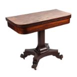 A Regency rosewood card table, the rounded rectangular fold-over top above an architectural