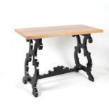 A Chelsea Textiles console table with rectangular oak top, on ebonised pierced supports, 124cms