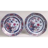 A pair of 18th century Chinese famille rose Export plates decorated with butterflies, flowers and