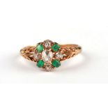 An early 19th century 18ct gold emerald and old cut diamond cluster ring, boxed, Approx. UK size