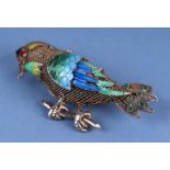 A Chinese enamel silver metal gilt brooch modelled in the form of a bird.