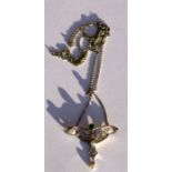 An Edwardian white metal and yellow gold, diamond, peridot and pearl pendant drop necklace, in the