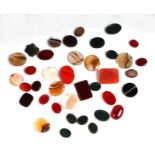 A quantity of hardstone cabochons.