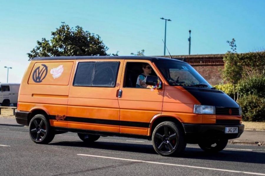 A 1992 Volkswagen T4 camper van, registration J42 SPF, orange. This 2.5 non turbo t4 camper van with