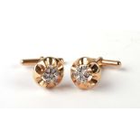 A pair of 9ct gold cufflinks with diamond clusters to the centre, 5.6g.