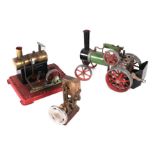 A Mamod steam traction engine,; together with a Mamod stationary engine; and a brass stationary