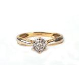 An 18ct gold and diamond cluster ring, approx UK size 'J', 1.9g.