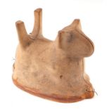 A 19th century aspic or blancmange pottery mould in the form of a dog, 26cms long.