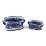 A Victorian style blue & white transfer decorated foot bath; together with another similar, 30cms