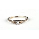 An 18ct white gold diamond solitaire ring, approx UK size 'M', 2g.