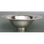 A Peter Muller-Munk hand wrought sterling silver flared bowl with planished finish, 989g, 32cms