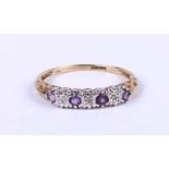 A 9ct gold diamond and amethyst ring, approx UK size 'T', 2g.