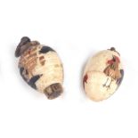 Two antique Japanese lacquered bone novelty charms, one containing dice , the other a chick, each