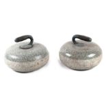A pair of early 20th century granite curling stones, each approx 28cms diameter (2).