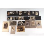 A quantity of photograph albums and loose photos depicting Chinese and Japanese figures, mainly in