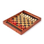A Jacques of London 'In Statu Quo' travelling chess set with stained and natural bone pieces, in a