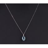 A 9ct white gold aquamarine pendant on a fine gold chain.