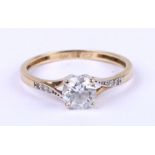 A 9ct gold ring set with a large cubic zirconia solitaire, approx UK size 'P', 1.4g.