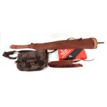 Shooting interest: A canvas gun slip; together with a leather and canvas cartridge belt; a Parker-