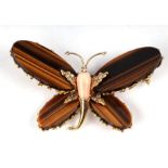 An 18ct gold and tigers eye butterfly brooch set with rose coral and diamonds, 6.5cms wide.