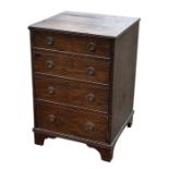 A 19th century mahogany chest of four graduated long drawers, on bracket feet, 58cms wide.